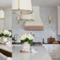 Our Classic Edie Sconces By Thomas O’Brien Add Warmth On Either Side Of The Range Hood: Storey Home Collection