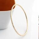 Crafted In 14ct Rolled Gold This Bangle Is The Perfect Addition: Louise Douglas Jewellery